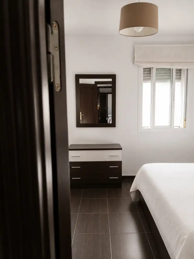 Habitación de Casa adosada en venta en Lora del Río con Aire acondicionado, Terraza y Trastero