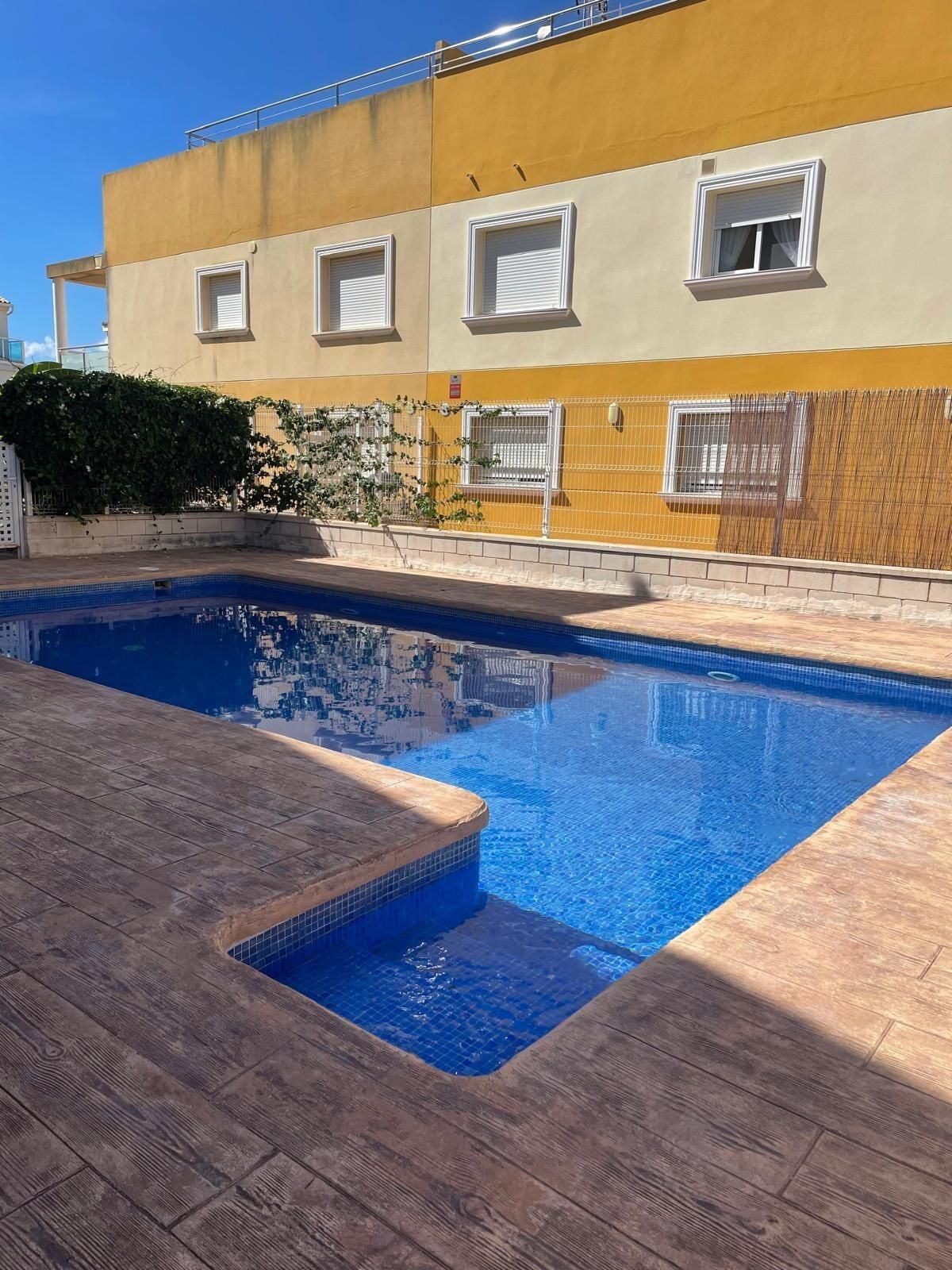 Piscina de Dúplex de alquiler en Oliva con Jardín privado, Terraza y Piscina comunitaria