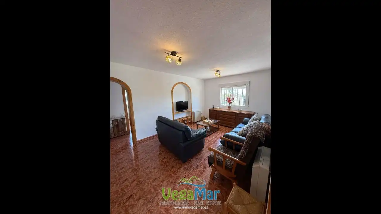 Sala d'estar de Casa o xalet de lloguer en Salobreña amb Jardí privat, Terrassa i Piscina
