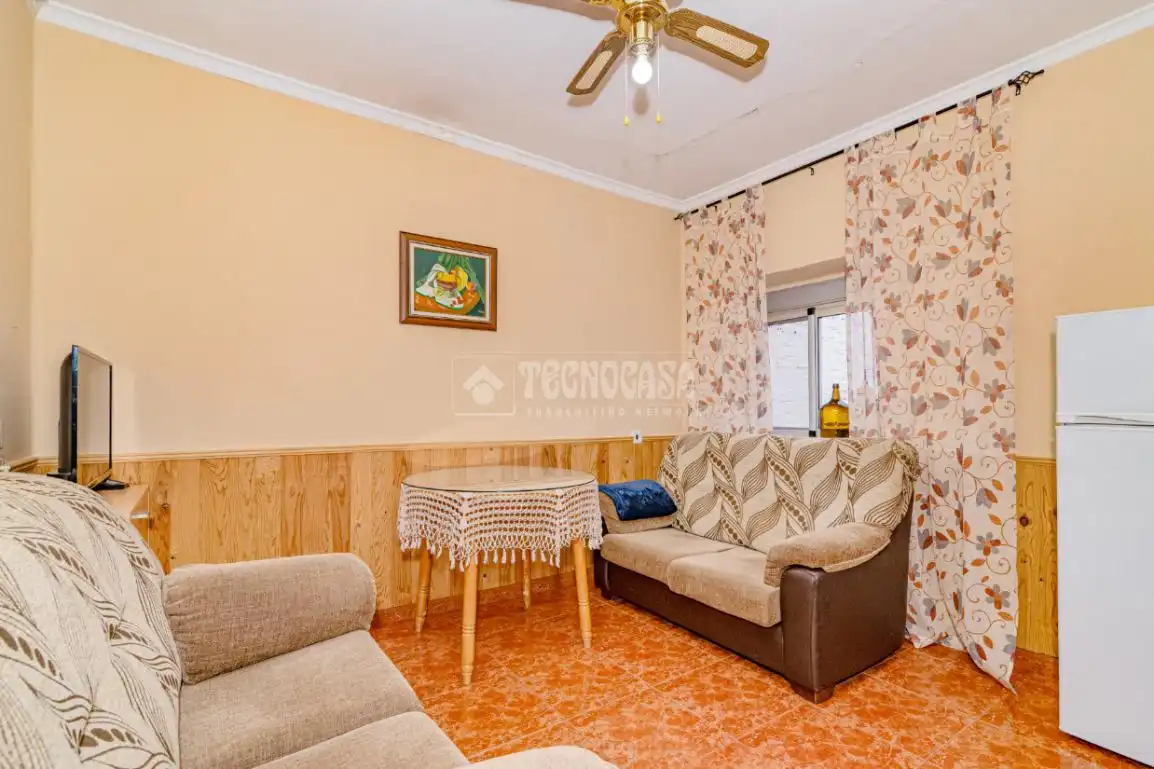 Sala de estar de Casa adosada en venta en Alhendín