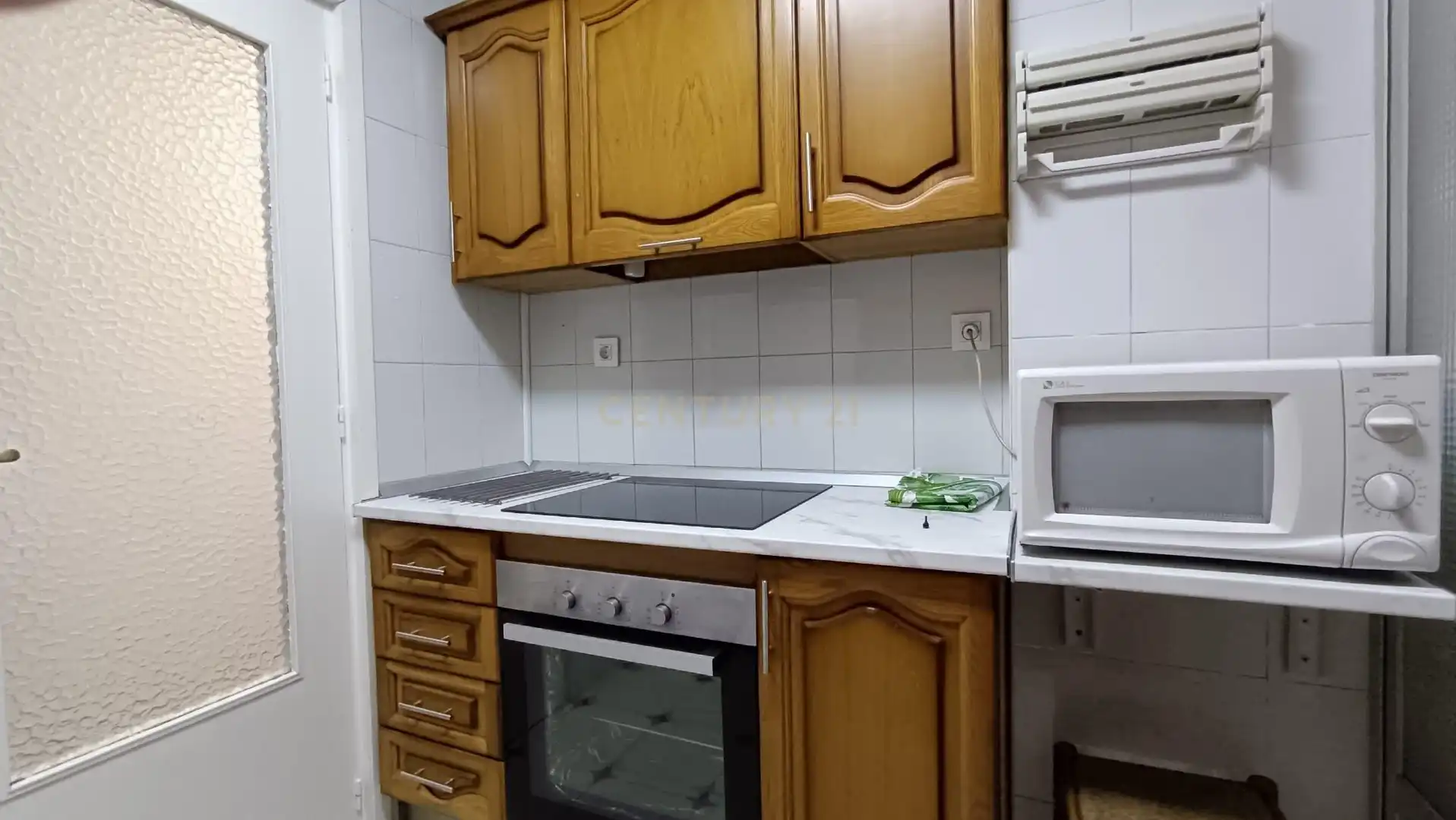Cuina de Pis per a compartir en Granada amb Aire condicionat, Rentadora i Microones
