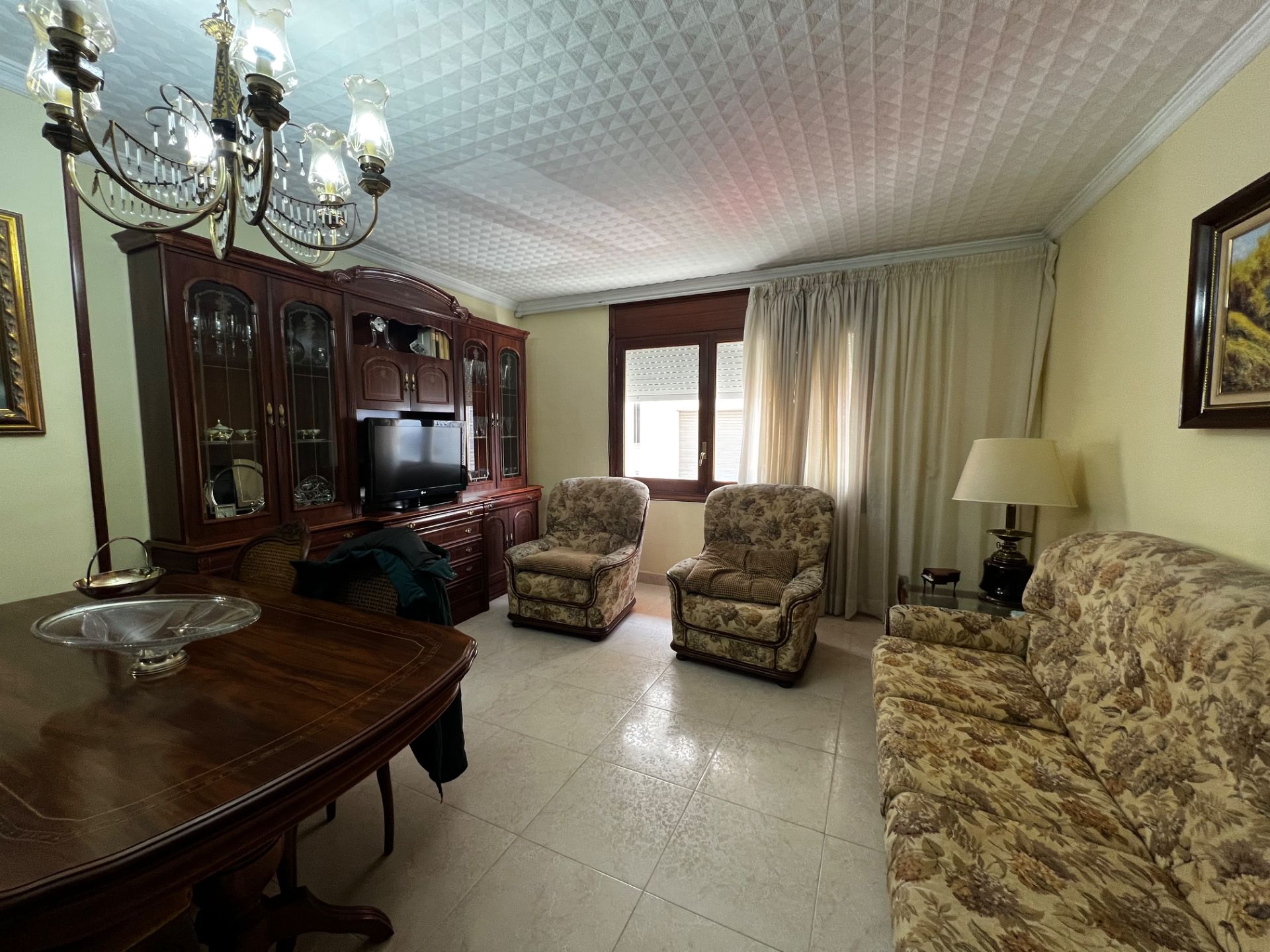 Wohnzimmer von Erdgeschoss zum Verkauf in Canet de Mar mit Klimaanlage, Heizung und Ofen