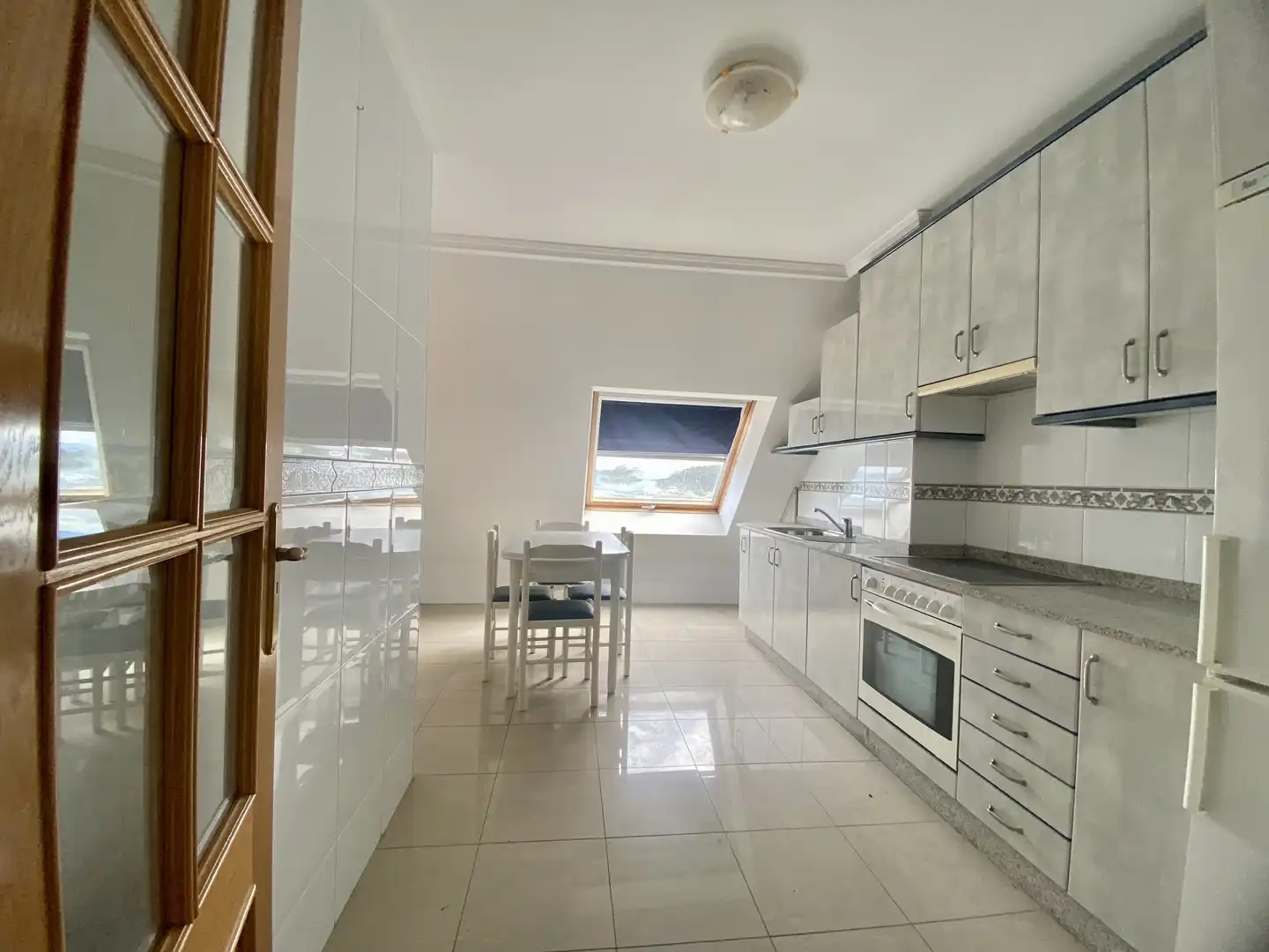 Kitchen of Attic for sale in O Grove    with Parquet flooring, Terrace and Storage room