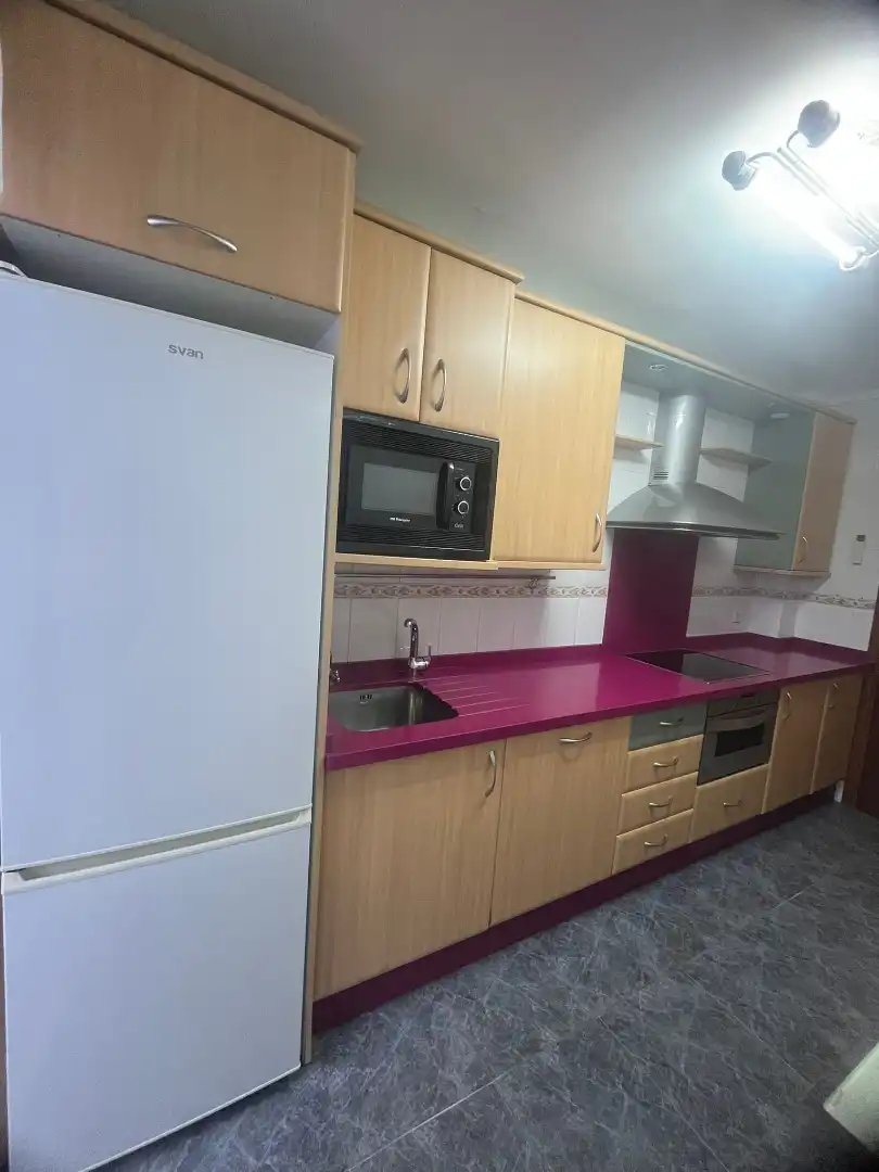 Cocina de Piso en venta en Vélez-Málaga con Aire acondicionado, Jardín privado y Amueblado