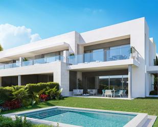 Exterior view of Single-family semi-detached for sale in Marbella  with Air Conditioner, Terrace and Swimming Pool