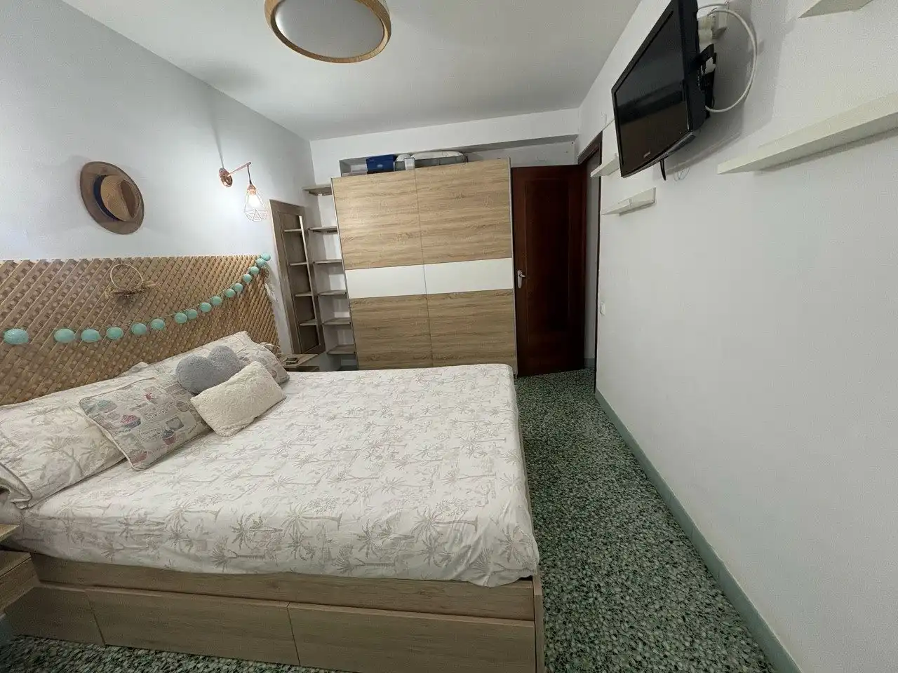 Schlafzimmer von Wohnung zum Verkauf in Cullera mit Klimaanlage, Privatgarten und Terrasse