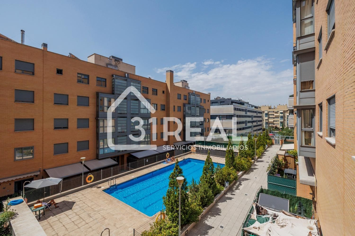 Swimming pool of Flat for sale in  Madrid Capital  with Air Conditioner, Heating and Private garden