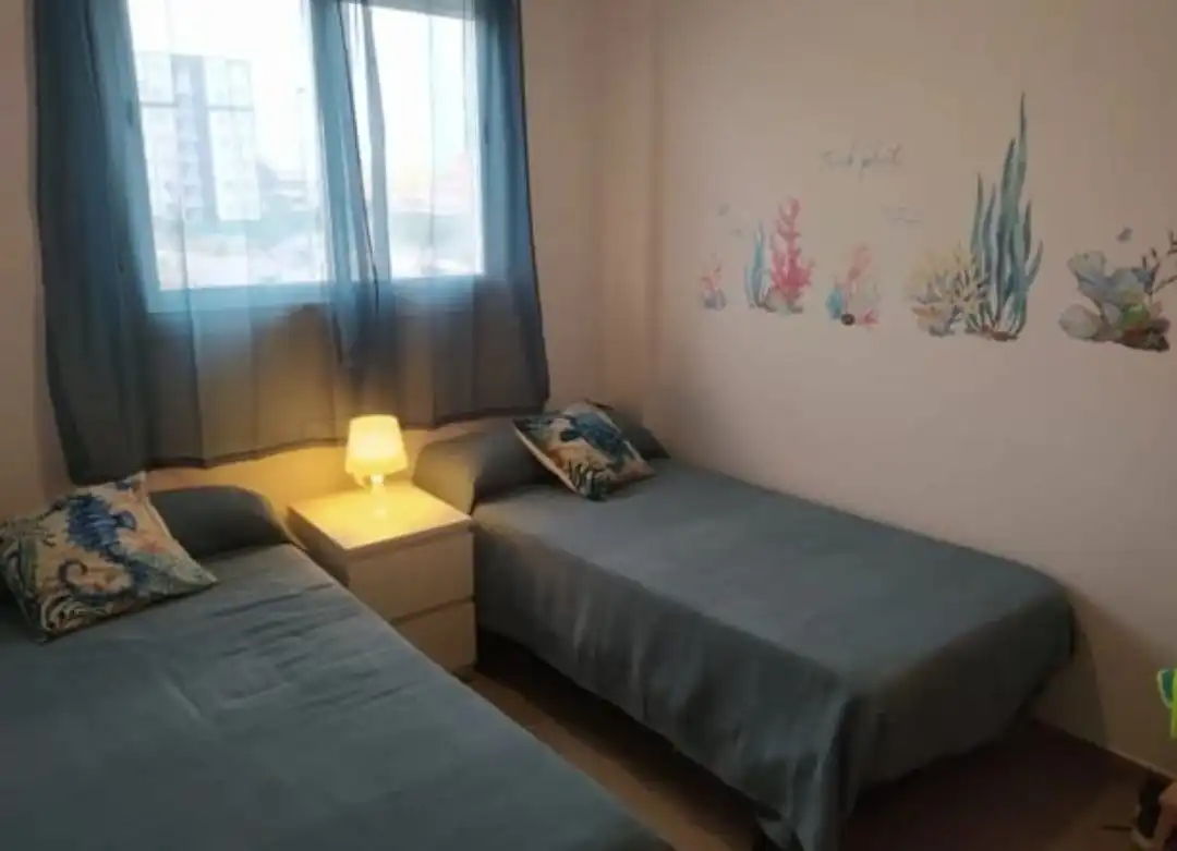 Dormitori de Apartament de lloguer en Piles amb Aire condicionat, Moblat i Forn