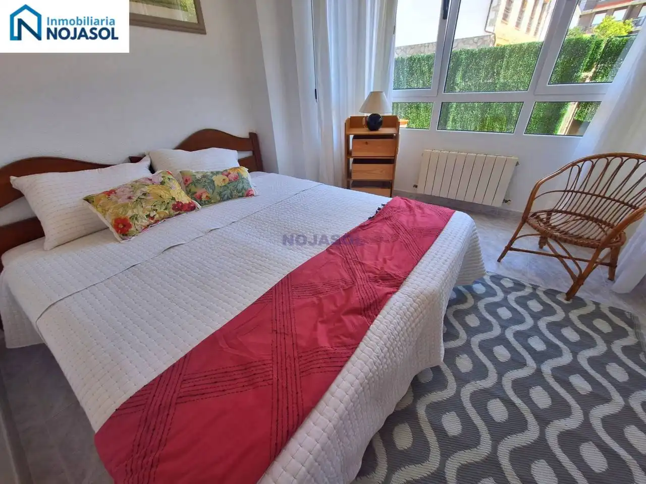 Dormitori de Apartament de lloguer en Noja amb Calefacció, Jardí privat i Terrassa