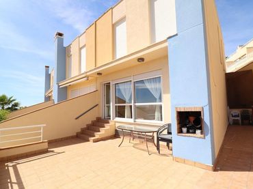 Casa aparellada amb piscina en venda a Orihuela Costa