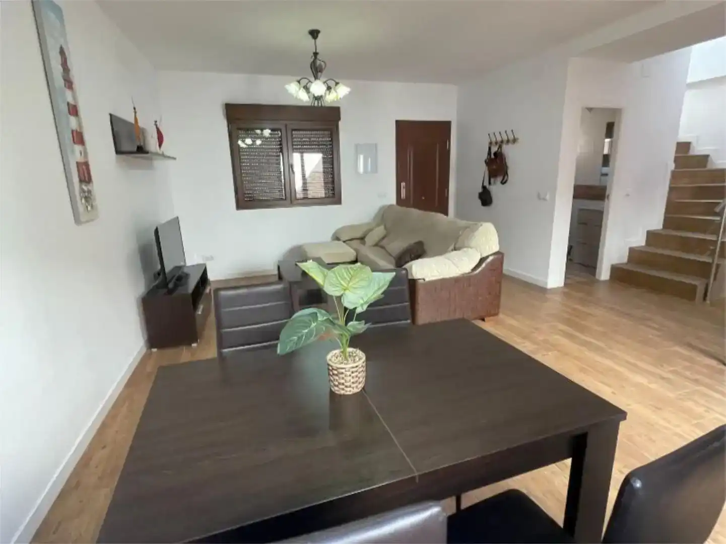 Sala d'estar de Casa adosada en venda en Chipiona amb Aire condicionat i Balcó