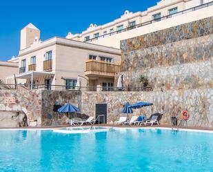 Piscina de Casa adosada en venda en Mogán amb Aire condicionat i Terrassa