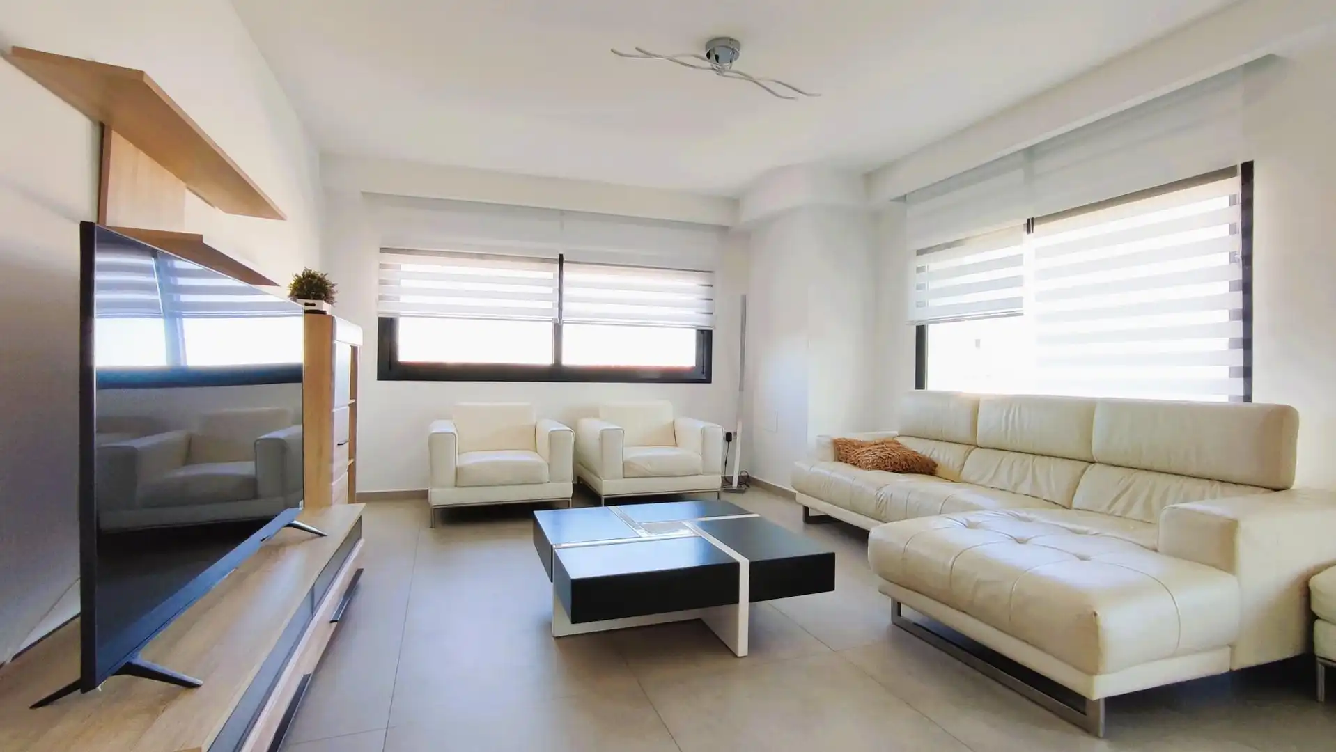 Sala d'estar de Casa o xalet en venda en Calpe / Calp amb Aire condicionat, Jardí privat i Terrassa