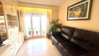 Living room of Flat for sale in Girona Capital  with Heating, Furnished and Balcony