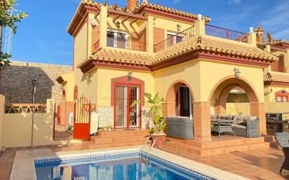 Vista exterior de Casa o xalet en venda en Torrox amb Aire condicionat i Piscina