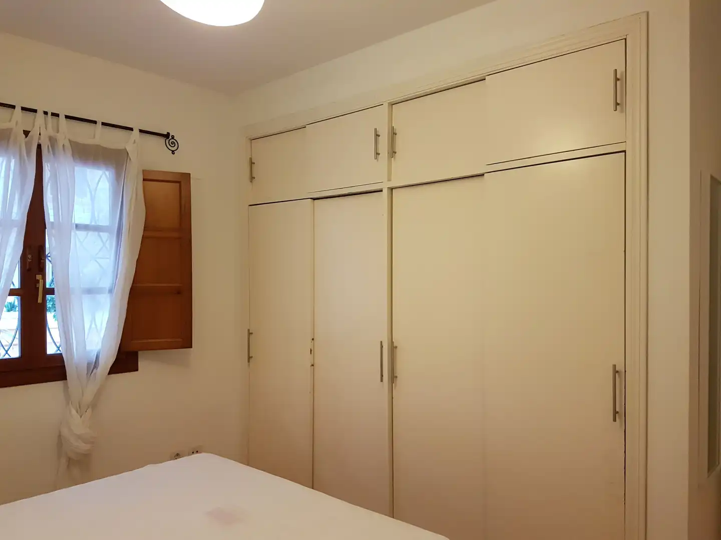 Dormitori de Apartament de lloguer en Sevilla amb Aire condicionat, Moblat i Rentadora