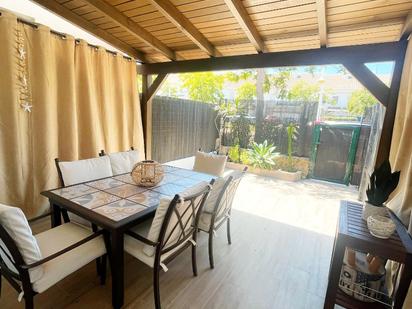 Terrassa de Casa adosada en venda en El Portil amb Aire condicionat, Jardí privat i Traster