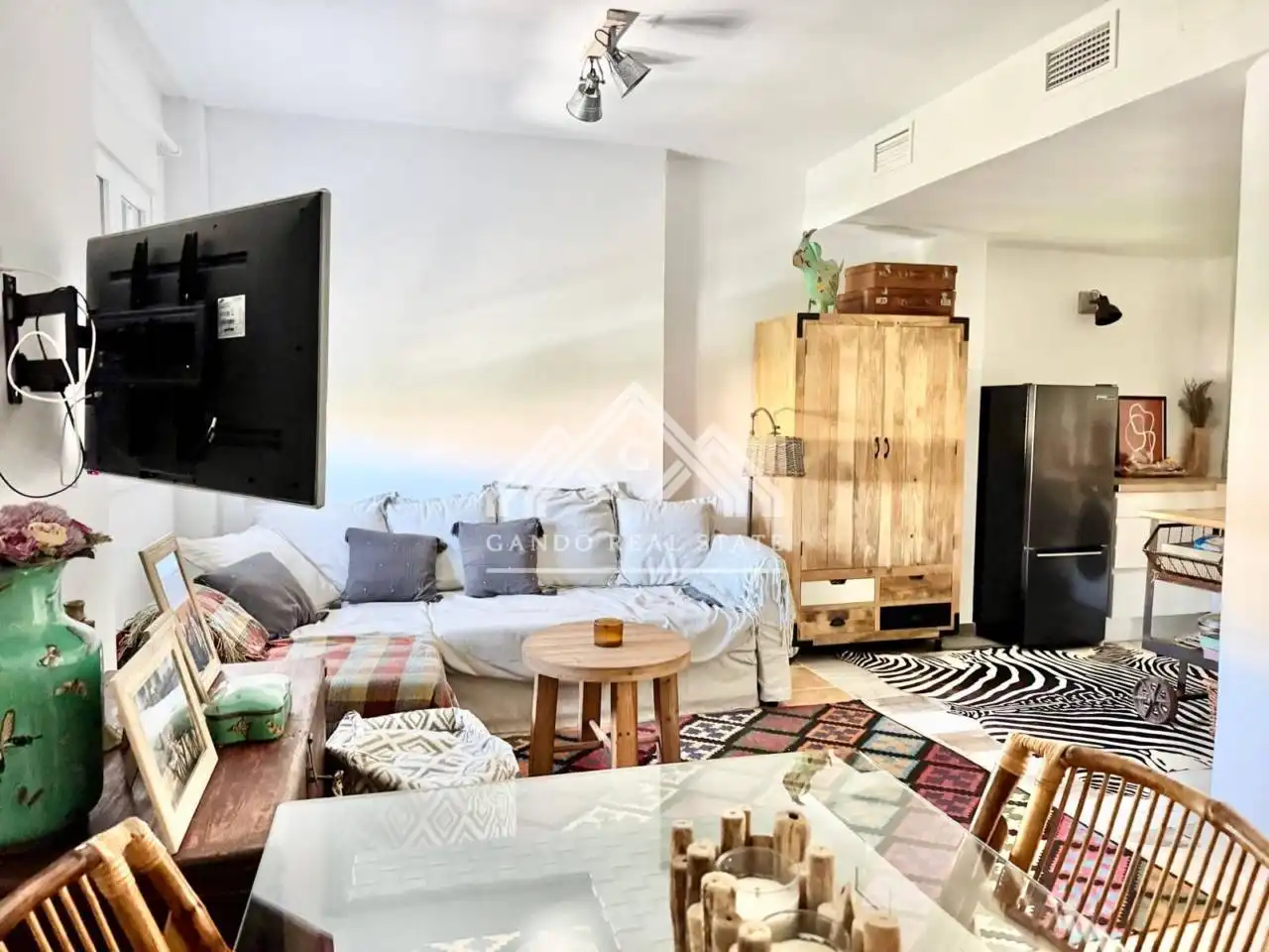 Sala d'estar de Casa adosada en venda en Dos Hermanas amb Aire condicionat