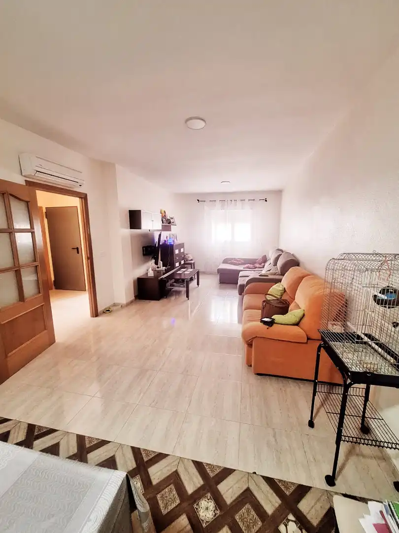 Sala de estar de Casa adosada en venta en El Ejido con Aire acondicionado, Terraza y Amueblado