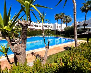 Jardí de Apartament de lloguer en Pulpí amb Aire condicionat, Terrassa i Piscina