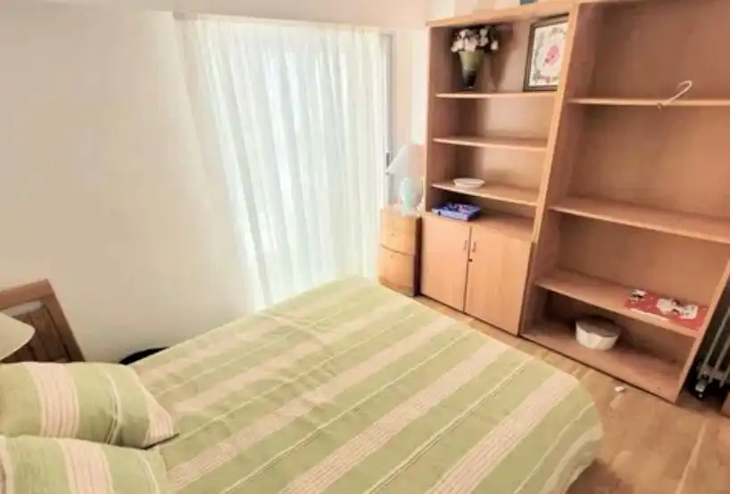 Habitación de Piso de alquiler en Benidorm con Aire acondicionado, Jardín privado y Amueblado