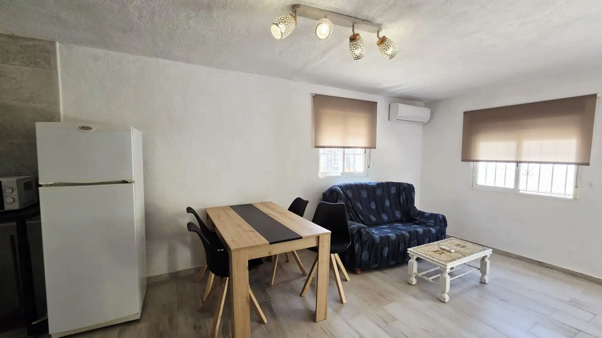 Sala de estar de Piso de alquiler en La Nucia con Aire acondicionado y Piscina comunitaria