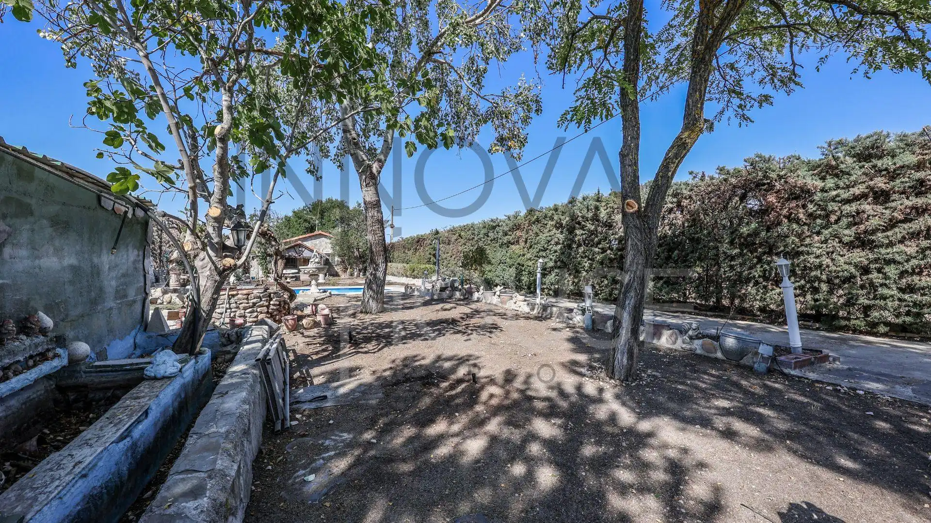 Vista exterior de Casa o xalet en venda en Talamanca de Jarama amb Jardí privat, Terrassa i Piscina
