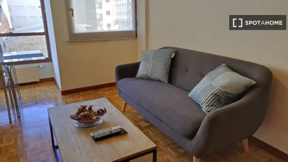 Sala de estar de Apartamento para compartir en Madrid con Aire acondicionado, Terraza y Amueblado