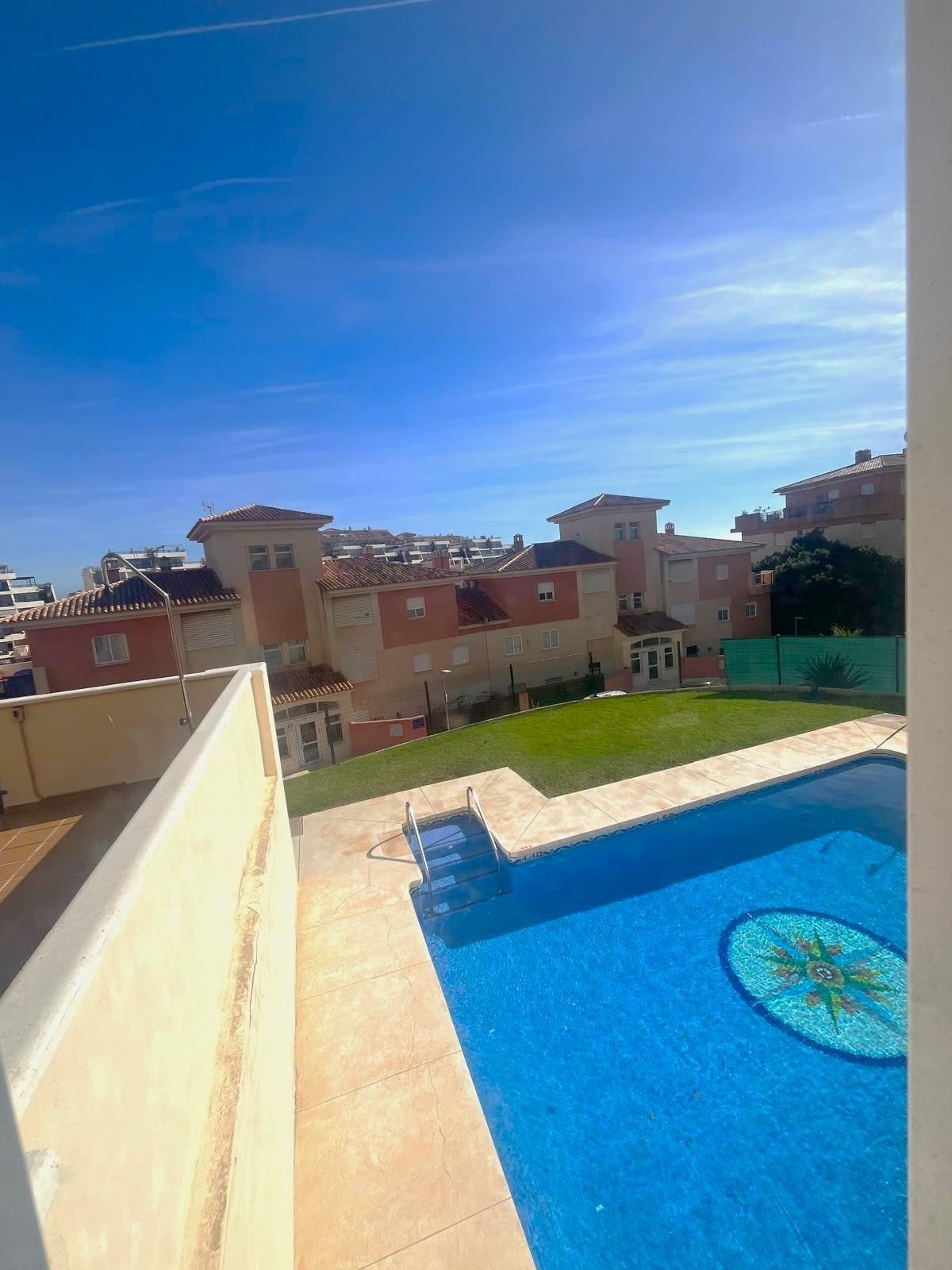 Swimming pool of Duplex for sale in Benalmádena  with Terrace and Community pool