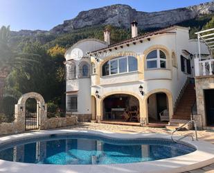 Exterior view of Single-family semi-detached for sale in Dénia  with Air Conditioner, Storage room and Swimming Pool