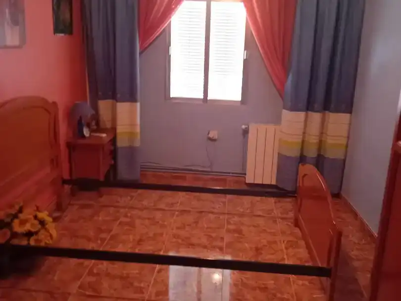 Dormitori de Casa adosada en venda en Martos amb Jardí privat, Traster i Piscina
