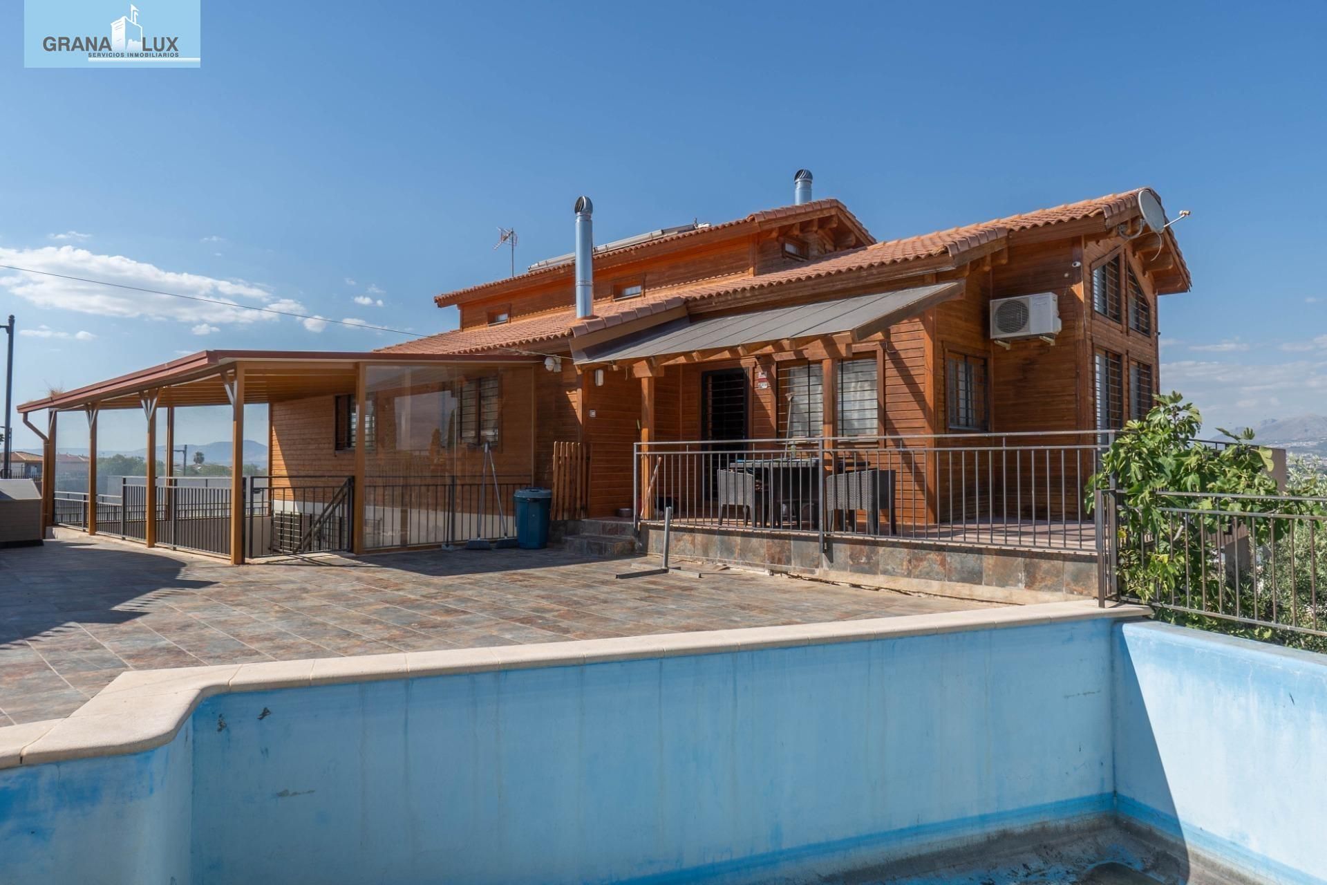 Exterior view of House or chalet for sale in Cúllar Vega  with Air Conditioner, Heating and Terrace