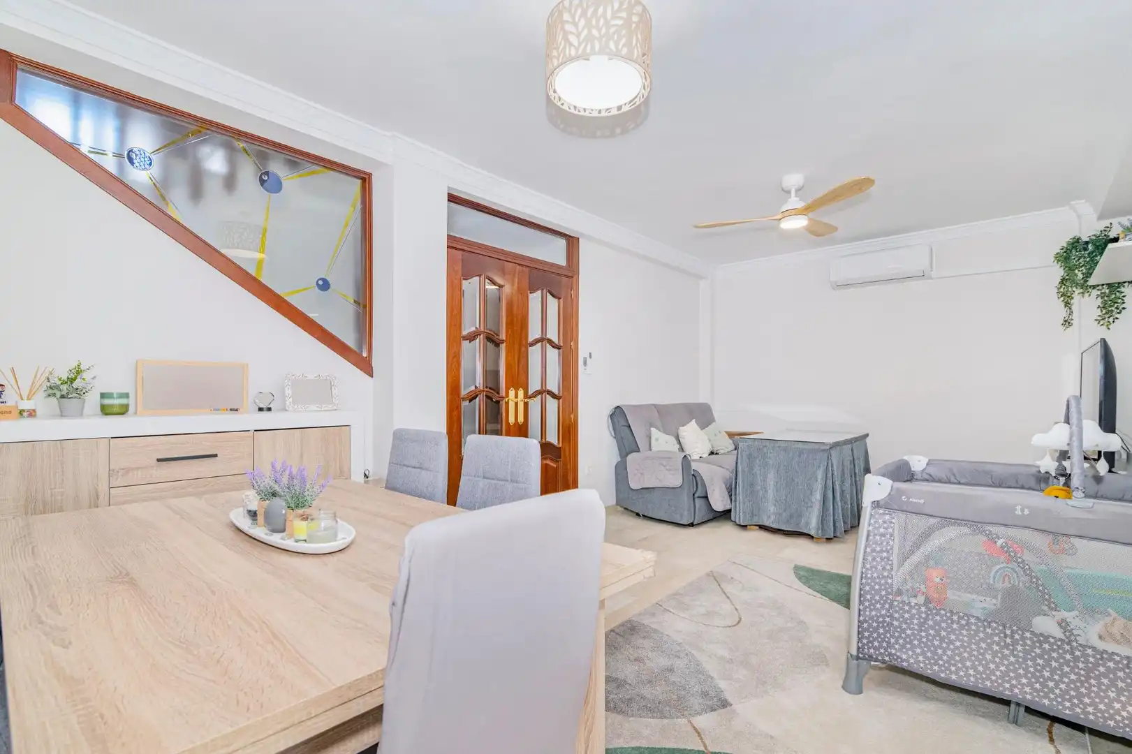 Sala de estar de Casa adosada en venta en Armilla con Aire acondicionado, Calefacción y Jardín privado