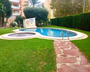 Swimming pool of Flat for sale in Benidorm  with Air Conditioner, Terrace and Community pool