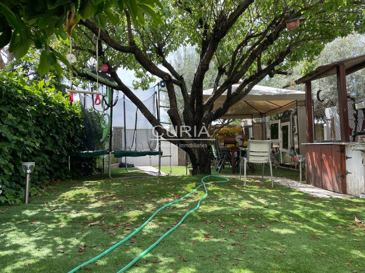 Jardí de Casa adosada en venda en Rosselló amb Aire condicionat, Calefacció i Terrassa