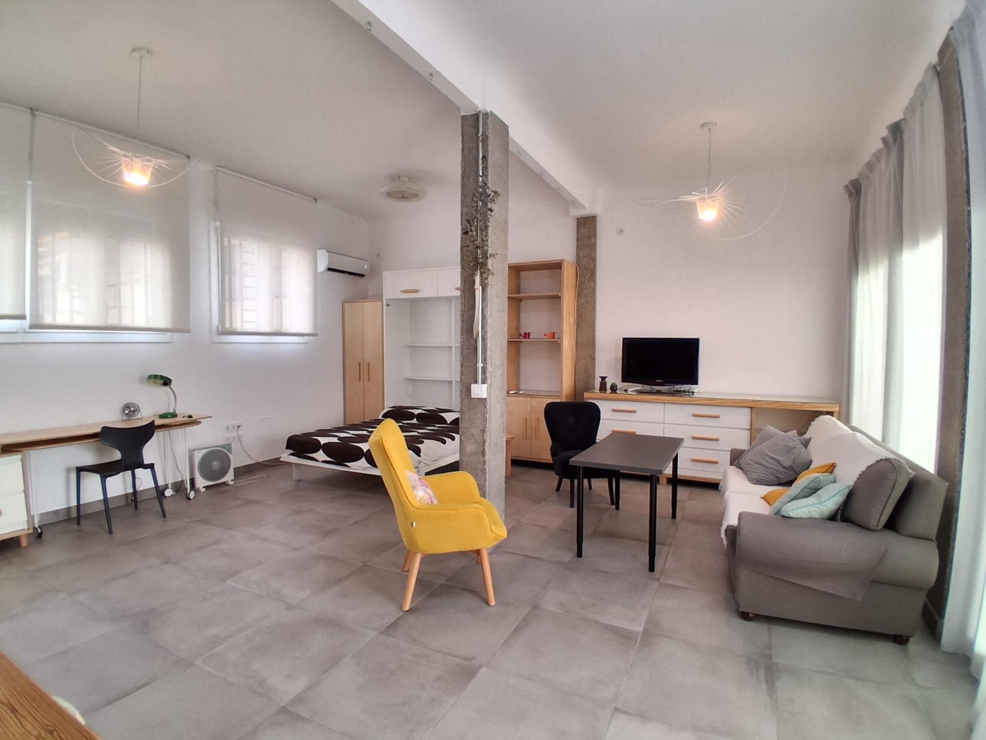 Living room of Apartment to rent in  Sevilla Capital  with Air Conditioner, Storage room and Swimming Pool