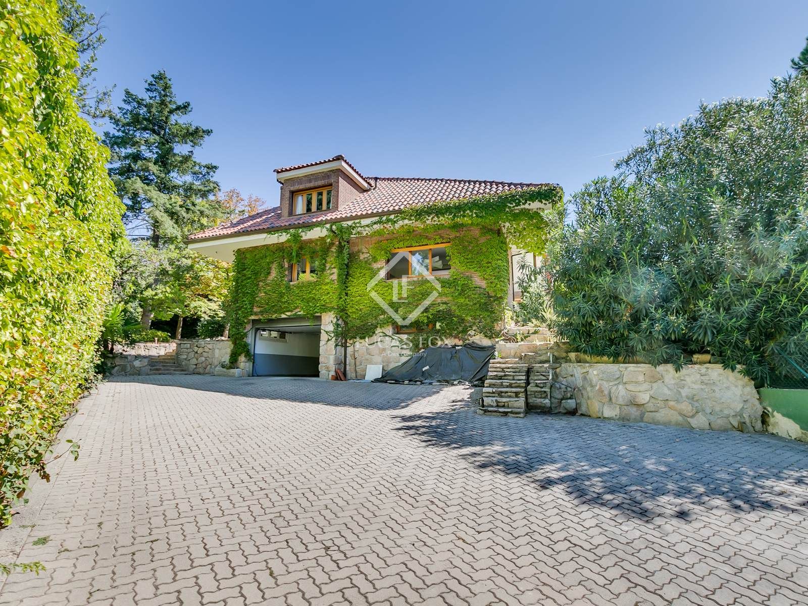 Vista exterior de Casa o chalet en venta en La Moraleja con Aire acondicionado, Calefacción y Jardín privado