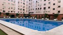 Swimming pool of Flat for sale in  Sevilla Capital  with Air Conditioner