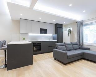 Sala d'estar de Apartament de lloguer en  Barcelona Capital amb Aire condicionat, Moblat i Forn