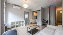 Living room of Flat to rent in  Madrid Capital  with Air Conditioner, Heating and Furnished
