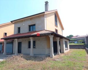 Vista exterior de Casa adosada en venda en Ames amb Calefacció, Jardí privat i Traster