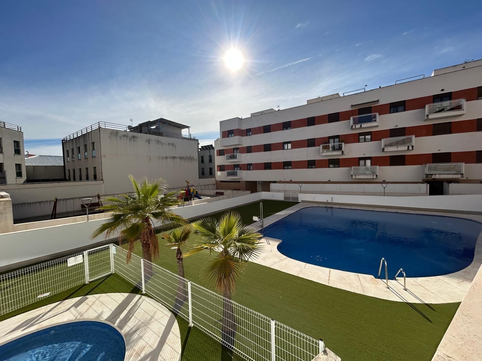 Swimming pool of Flat for sale in Dos Hermanas  with Air Conditioner, Private garden and Terrace