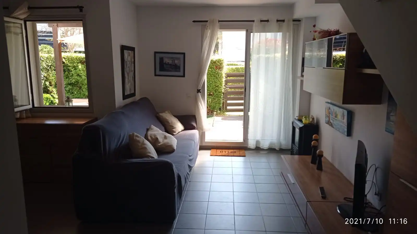 Sala de estar de Casa adosada en venta en Mont-roig del Camp con Aire acondicionado, Jardín privado y Terraza