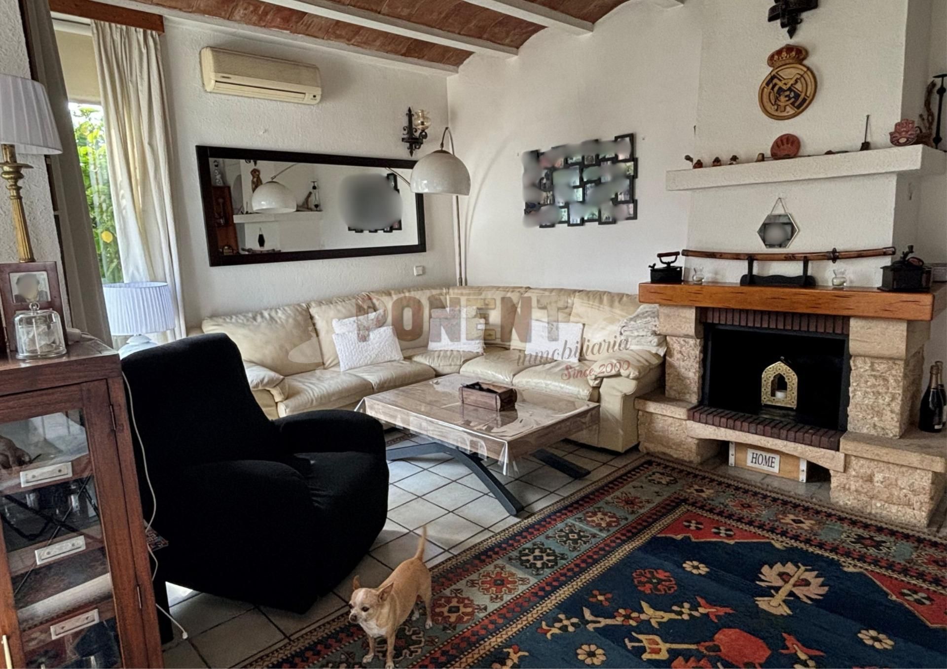 Sala d'estar de Casa o xalet en venda en Santa Eulària des Riu amb Aire condicionat, Jardí privat i Terrassa