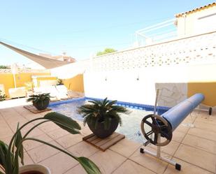 Swimming pool of Single-family semi-detached for sale in Orihuela  with Air Conditioner, Private garden and Terrace