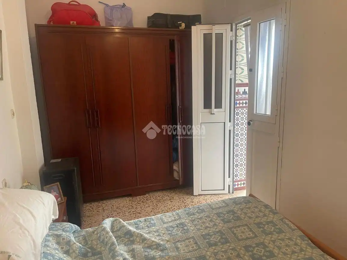 Dormitori de Casa adosada en venda en Sevilla amb Aire condicionat