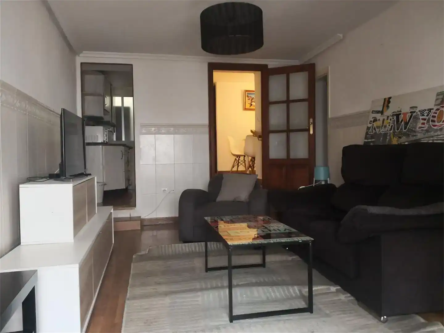 Sala d'estar de Casa adosada en venda en Malpartida de Cáceres amb Aire condicionat, Moblat i Balcó