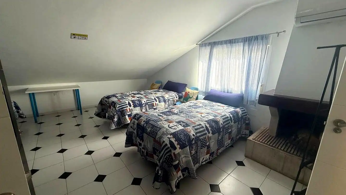 Habitación de Casa adosada en venta en Málaga con Aire acondicionado y Piscina comunitaria