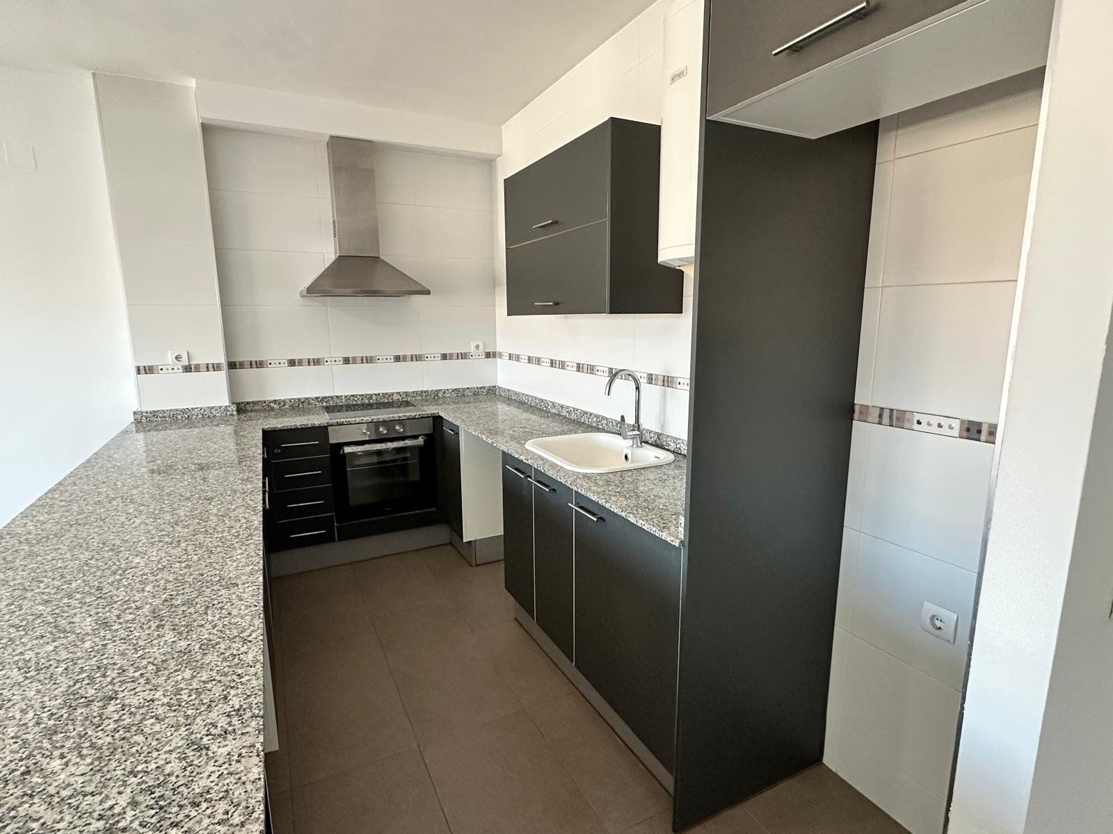 Kitchen of Flat to rent in Alginet  with Storage room and Alarm