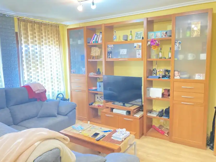 Sala de estar de Dúplex en venta en Villaquilambre con Calefacción, Trastero y Horno